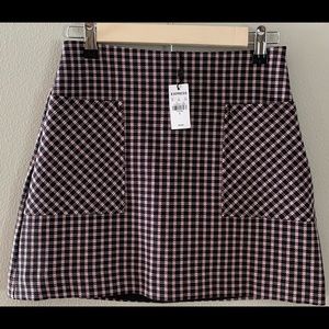 Plaid mini skirt from Express. Size 0, NET.